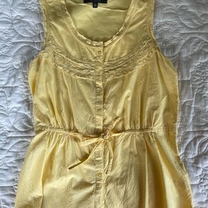 Ladies sleeveless button and tie from top